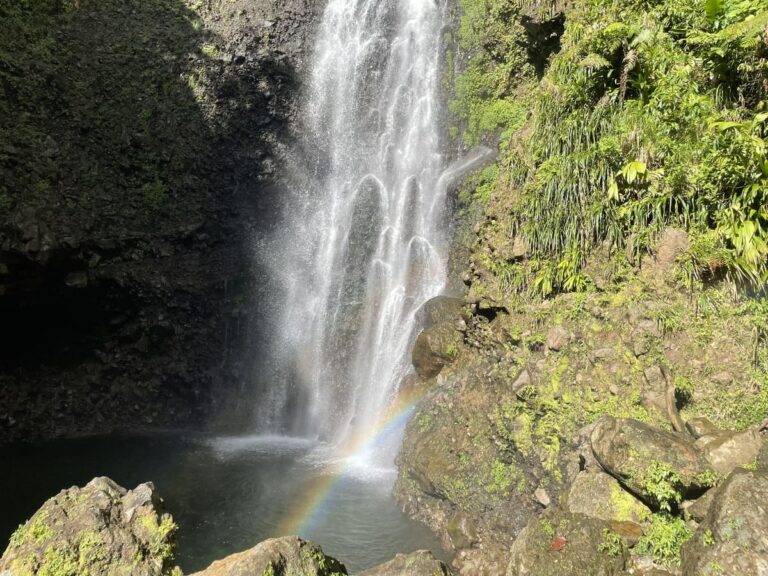 An image showing a beautiful rainbow in front of a waterfall in Domica. Rainbows are a fascinating natural phenomenon that occur when sunlight passes through raindrops in the air, causing the light to refract and create a spectrum of colors. This image is part of a post that explains how rainbows are formed, including the science behind their colors and the various types of rainbows that can be seen in the sky.